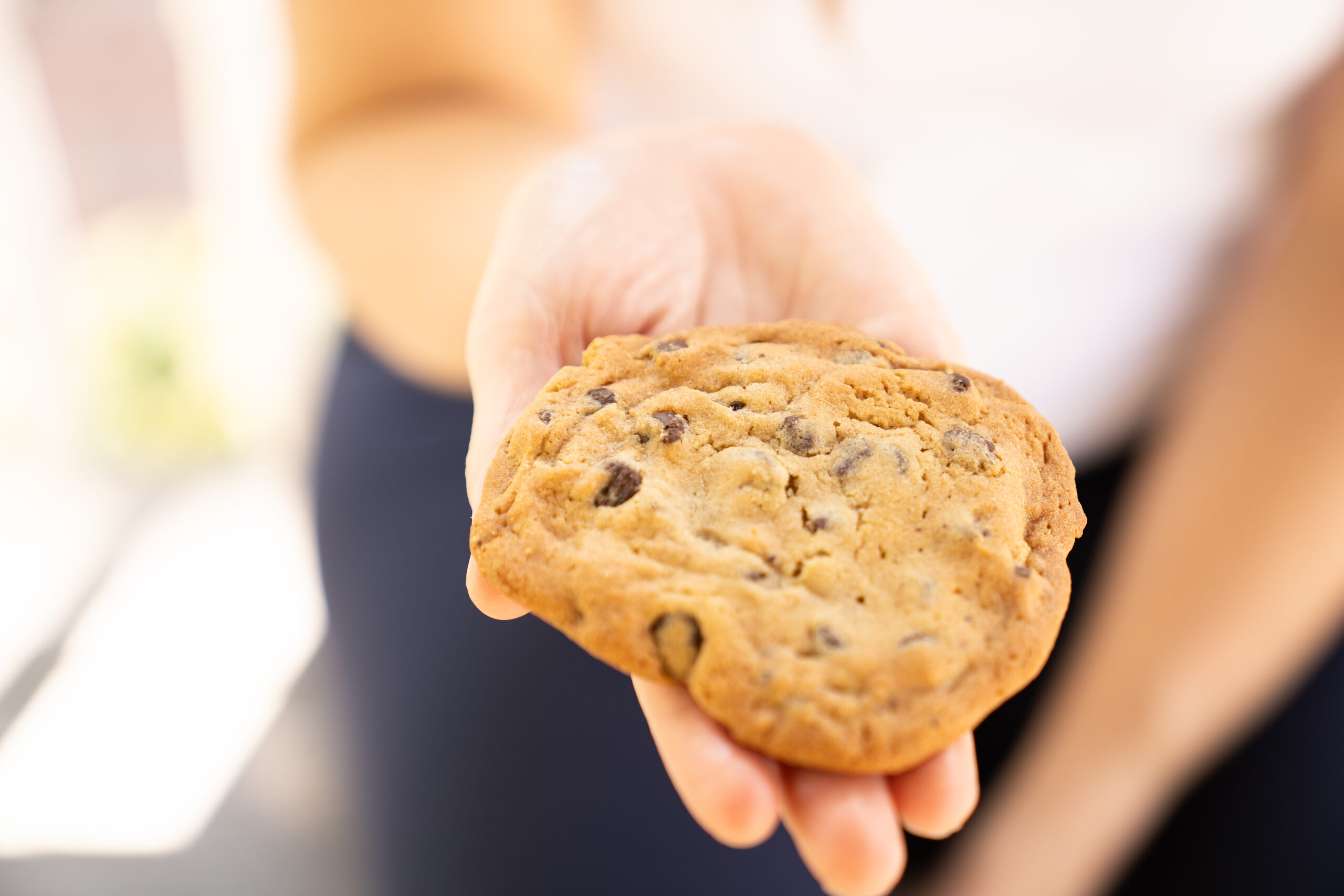 Holding a freshly baked cookie